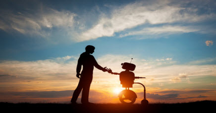Man and robot shaking hands
